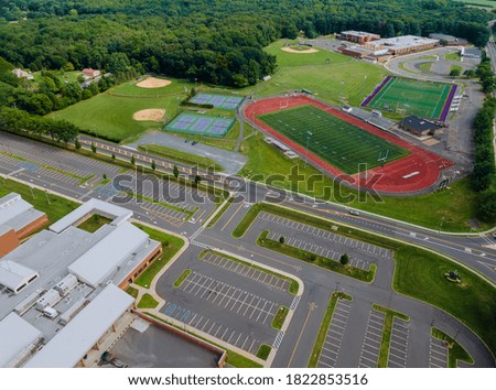 Aerial view of during the quarantine coronavirus, school closed of empty stadium with basketball field and training ground in park