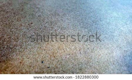 Grunge craft paper texture background with copy space. Soft focus of rough brown paper texture. Recycling waste into cardboard