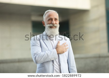 Hello, Welcoming Beard Casual Senior Man Standing Outdoor.