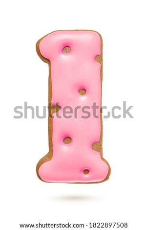 Number 1 pink gingerbread biscuit isolated on white background. Christmas decoration