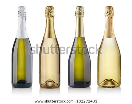 Set of champagne bottles. Isolated on white background Royalty-Free Stock Photo #182292431