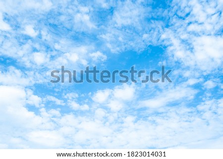White clouds in blue sky for background