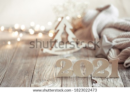 New year 2021 holiday background with decor . Blurry lights in the background. The concept of the celebration.