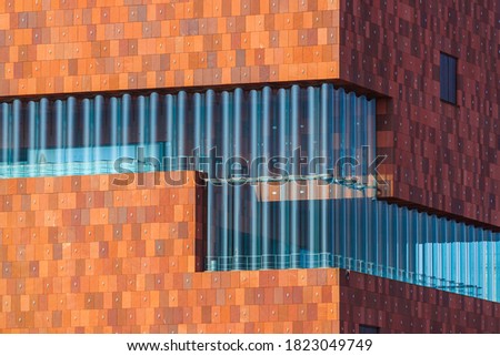 Building of the MAS museum in Antwerp Belgium - architecture background Royalty-Free Stock Photo #1823049749