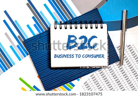 Notebook with Toolls and Notes about B2C with charts and pen ,concept. Business