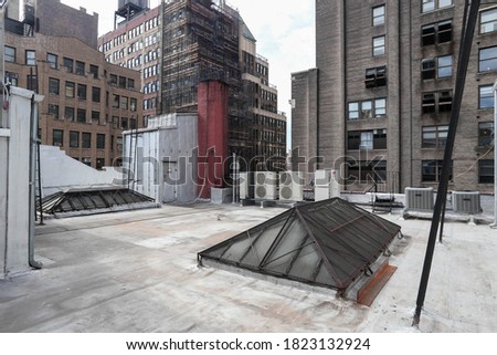 These are photos of a rooftop in Manhattan. Royalty-Free Stock Photo #1823132924