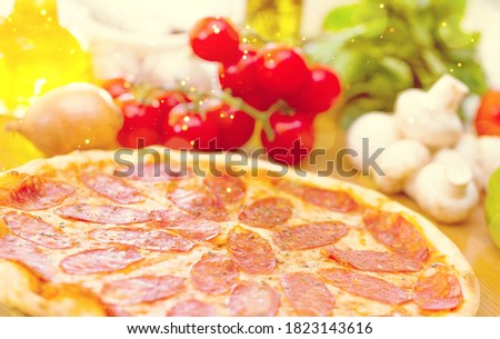 Delicious cheesy pizza with many fillings on a platter