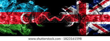 Azerbaijan, Azerbaijani vs United Kingdom, British smoky mystic flags placed side by side. Thick colored silky abstract smoke flags