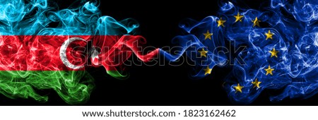 Azerbaijan, Azerbaijani vs European Union, EU smoky mystic flags placed side by side. Thick colored silky abstract smoke flags