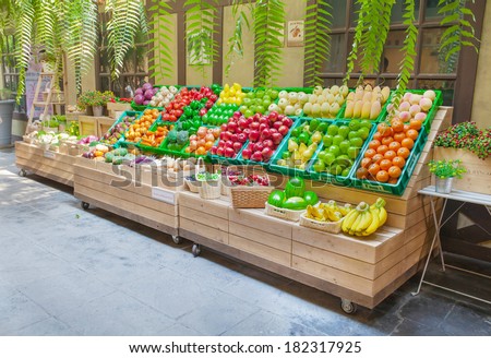 Fresh fruits shop at a market  Royalty-Free Stock Photo #182317925