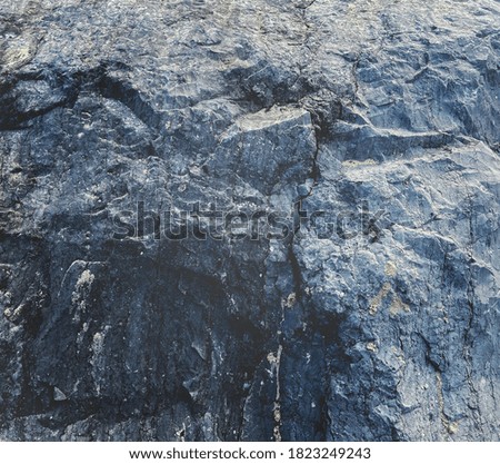 Gray with light blue color stone background and gap, crack