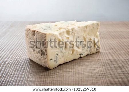 Gorgonzola Italian traditional aged blue cheese on wooden background Royalty-Free Stock Photo #1823259518