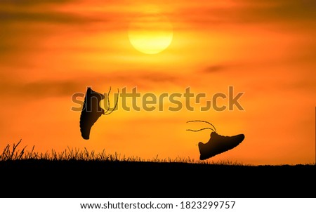 Concept design for Trail running : Silluette running Shoe runnong along the track at the sunset time. Royalty-Free Stock Photo #1823299757