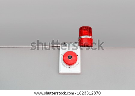 emergency signal lamp and sound on gray wall background, warning system
