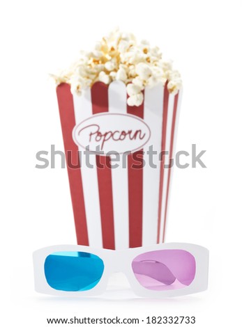 a bag full of popcorn and a pair of 3D glasses with white background