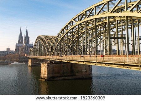 View Cologne Cathedral and Hohenzollern Bridge in Cologne, Germany