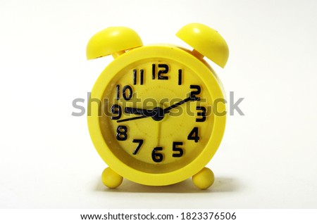A beautiful  and  colorful small alarm clock Royalty-Free Stock Photo #1823376506