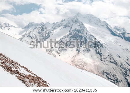 North Caucasus,  mountain valley with snow capped peaks, mountain landscape