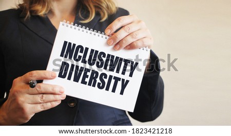 Inclusivity diversity Businesswoman holding big card with a message text written on it. Business social concept