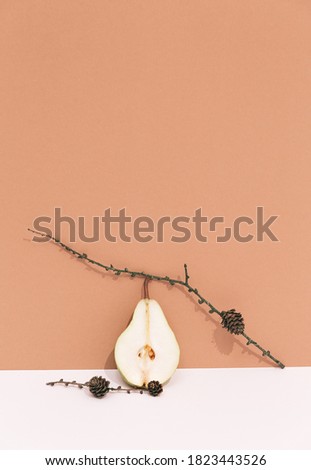 Fashion Still life scene with fresh pears. Minimalist details aesthetic. Eco life. Trendy beige pastel colours