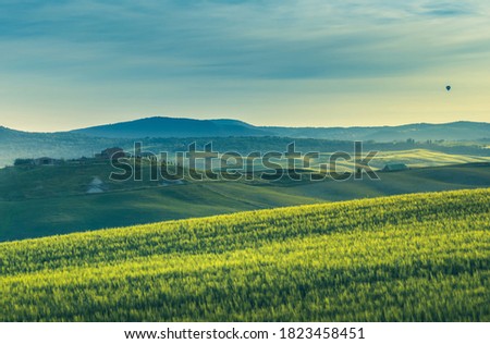 tuscany lanscape, sunset time, Italy Royalty-Free Stock Photo #1823458451