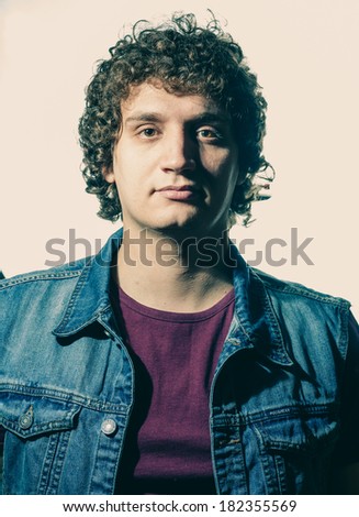Front view curly white man in studio