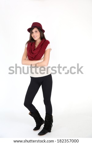 Young trendy girl standing on white background