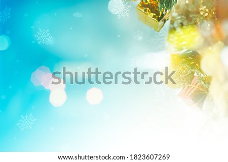 Christmas background with snowflakes on aqua blue bokeh background. Christmas background