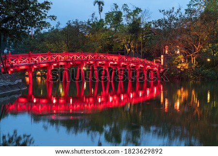 Red Bridge- The Huc Bridge in Hoan Kiem Lake, center of Hanoi, Vietnam Royalty-Free Stock Photo #1823629892