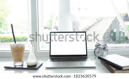 Office Desk workspace top view for present advertising product on tablet screen.