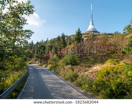 Trip to Jested mountain with popular Jested tower and hotel. Visible telecommunication transmitter building, 