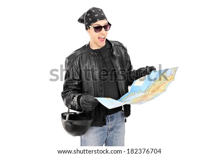 Male biker looking at a map isolated on white background