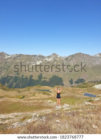 woman on the peak of mountain 