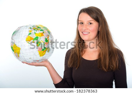 Young woman with a globe