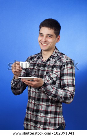 Man with cup of coffee on a white background (isolated) 
