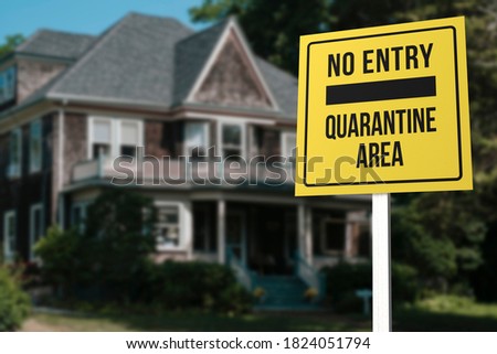 A No Entry Quarantine Zone in front of an American style home.