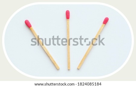 Three pink matches on white background. Top view. Royalty-Free Stock Photo #1824085184