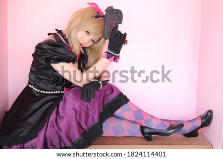 game uniform costume young woman in pink room