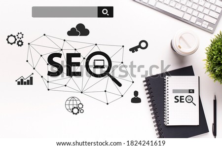 Seo Strategy Concept. Seo-Optimization Scheme With Web Icons Over White Office Table Background With Keyboard. Internet Content Promotion And Search Engine Optimization. Collage