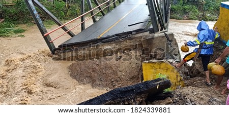 the rushing water destroyed the bridge
