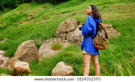 Young woman backpacker enjoy the view at mountain