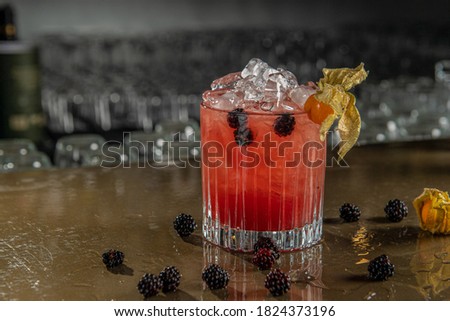 cocktail with berries and ice