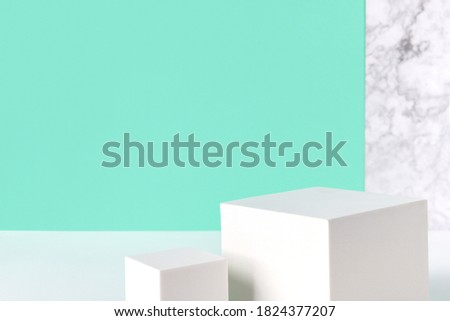 Abstract background mock up with podium for product display on turquoise. Blank product stand in minimal slyle. Royalty-Free Stock Photo #1824377207
