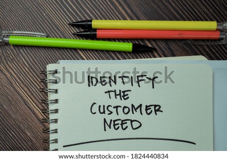 Identify The Customer Need write on a book isolated on office desk.