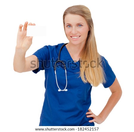 Portrait of a happy young Doctor holding a blank sheet of paper on white to write your text. Isolated on white background.