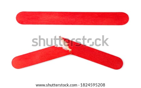 Two red wooden medical tongue depressors, throat inspection spatulas, isolated on white background, top view Royalty-Free Stock Photo #1824595208