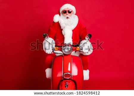 Wow. Photo of retired grandpa white beard ride retro scooter surprised stuck heavy traffic jam rush hour christmas eve wear x-mas costume coat sunglass cap isolated red color background