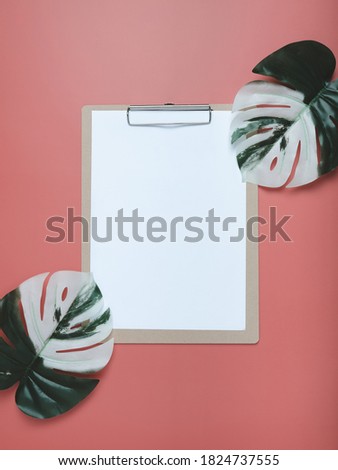 Blank clipboard on pastel background. Office concept