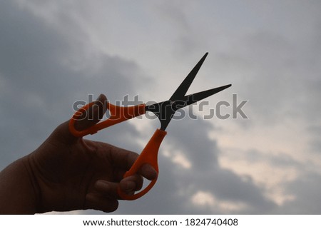 Picture of scissors taken in a natural background.