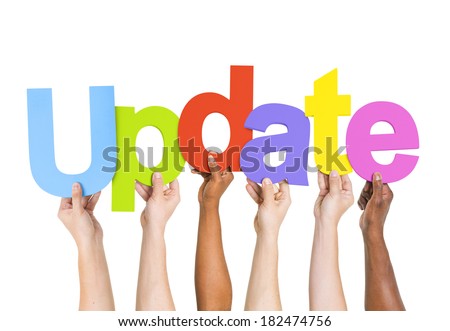 Diverse Hands Holding The Word Update Royalty-Free Stock Photo #182474756